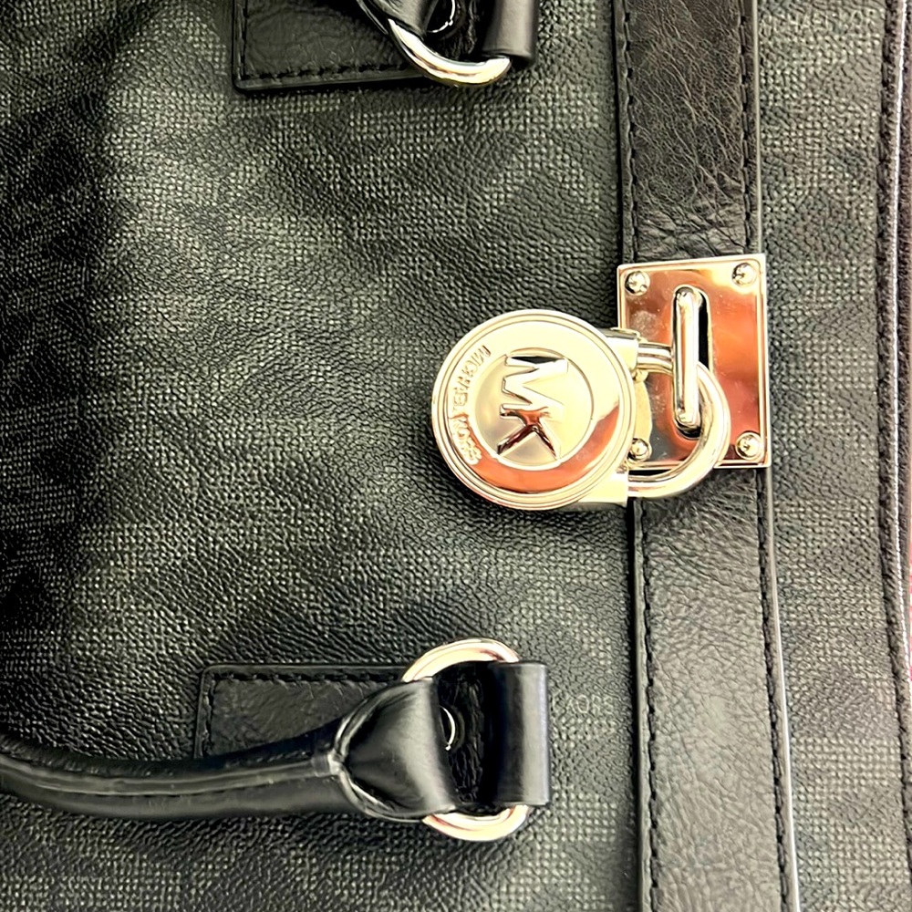 Beautiful Michael Kors black bag with Silver